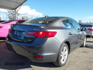 2013 Acura ILX Hybrid Technology z VIN 19VDE3F71DE300659, wystawiony jako IAAI lot #41754346 z przebiegiem 84 061 mil mil oraz . Historia ofert i sprzedaży dostępna na DreamBid. Obrazek 4.