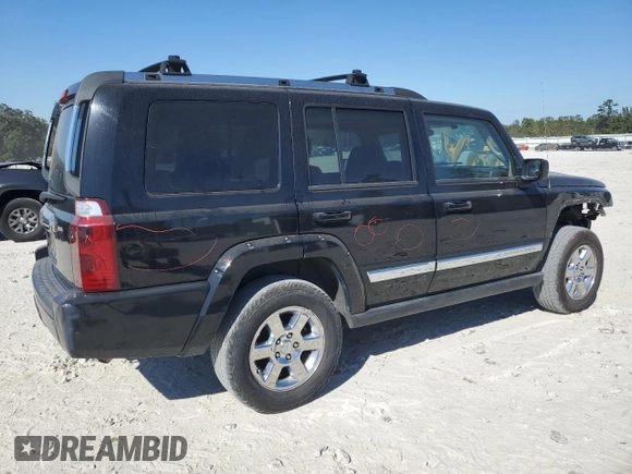 2006 Jeep Commander Limited with VIN 1J8HH58N56C291880, listed as a Copart auction lot 71543874 with 217,366 mi miles and Salvage title. Bid and sale history available at DreamBid. Image 3.