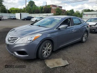 2013 Hyundai Azera z VIN KMHFG4JG3DA227946, wystawiony jako Copart lot #62827305 z przebiegiem 113 630 mil mil oraz Szkoda całkowita • Salvage title. Historia ofert i sprzedaży dostępna na DreamBid. Obrazek 1.