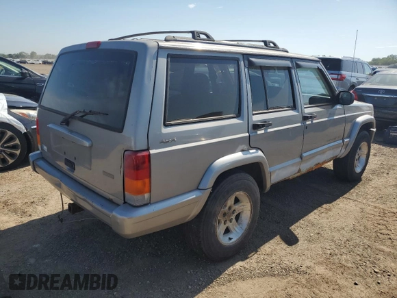 2001 Jeep Cherokee Sport z VIN 1J4FF58S61L540796, wystawiony jako Copart lot #62384895 z przebiegiem 209 294 mil mil oraz Czysty tytuł • Clean title. Historia ofert i sprzedaży dostępna na DreamBid. Obrazek 3.