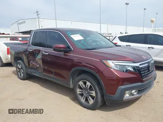 2018 Honda Ridgeline RTL-E with VIN 5FPYK3F70JB014641, listed as a IAAI auction lot 41685580 with 64,824 mi miles and . Bid and sale history available at DreamBid. Image 1.