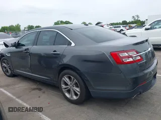 2015 Ford Taurus SEL with VIN 1FAHP2E81FG163058, listed as a IAAI auction lot 42221098 with 127,957 mi miles and . Bid and sale history available at carsss.com. Image 14.