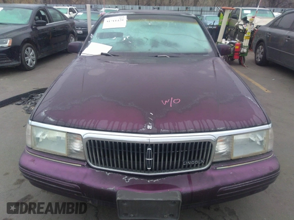 1994 Lincoln Continental with VIN 1LNLM9840RY602663, listed as a IAAI auction lot 31711429 with 90,889 mi miles and . Bid and sale history available at DreamBid. Image 6.