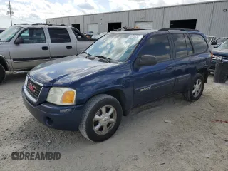 2004 GMC Envoy SLE with VIN 1GKDS13S342428948, listed as a Copart auction lot 52488385 with 292,426 mi miles and Salvage Title. Bid and sale history available at carsss.com. Image 1.