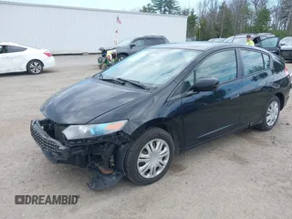 2010 Honda Insight LX with VIN JHMZE2H58AS014396, listed as a IAAI auction lot 42097224 with 167,505 mi miles and . Bid and sale history available at DreamBid. Image 2.