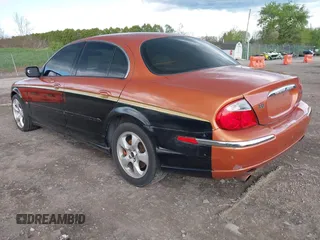 2001 Jaguar S-Type V6 z VIN SAJDA01C51FL84719, wystawiony jako IAAI lot #42192335 z przebiegiem 160 095 mil mil oraz . Historia ofert i sprzedaży dostępna na DreamBid. Obrazek 3.