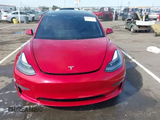 2021 Tesla Model 3 Long Range with VIN 5YJ3E1EB2MF015279, listed as a IAAI auction lot 41765428 with 55,486 mi miles. Bid and sale history available at carsss.com. Image 6.