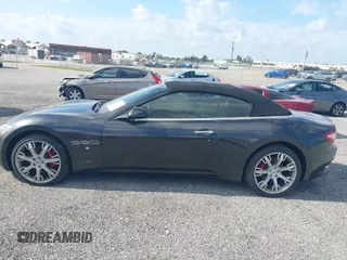 2013 Maserati GranTurismo Convertible Sport with VIN ZAM45MMA2D0069786, listed as a IAAI auction lot 40874830 with 37,312 mi miles. Bid and sale history available at carsss.com. Image 14.