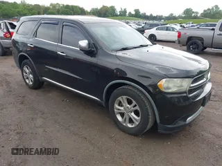 2012 Dodge Durango SXT with VIN 1C4RDHAG2CC152208, listed as a IAAI auction lot 42063392 with 203,957 mi miles. Bid and sale history available at carsss.com. Image 1.