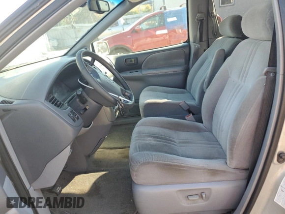 2003 Toyota Sienna LE with VIN 4T3ZF13C33U552593, listed as a Copart auction lot 77281524 with 177,659 mi miles and Clean Title. Bid and sale history available at carsss.com. Image 7.