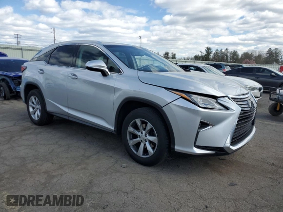 2016 Lexus RX 350 F Sport with VIN 2T2BZMCA3GC026050, listed as a Copart auction lot 52164055 with 100,856 mi miles and Salvage Title. Bid and sale history available at carsss.com. Image 4.
