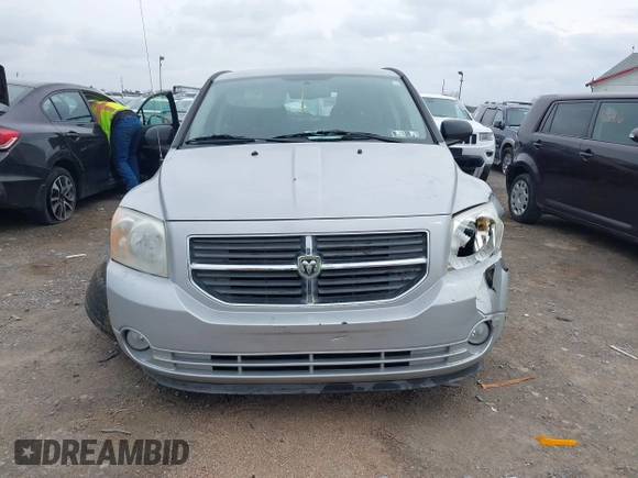 2011 Dodge Caliber Mainstreet with VIN 1B3CB3HA2BD238032, listed as a IAAI auction lot 41865918 with 98,022 mi miles and . Bid and sale history available at DreamBid. Image 12.