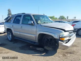 2004 Chevrolet Tahoe LS with VIN 1GNEC13T64J282970, listed as a IAAI auction lot 41879458 with 205,952 mi miles. Bid and sale history available at carsss.com. Image 13.