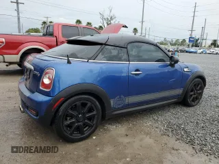 2014 MINI Coupe S z VIN WMWSX3C59ET772948, wystawiony jako Copart lot #81220834 z przebiegiem 99 211 mil mil oraz Szkody całkowita. Historia ofert i sprzedaży dostępna na DreamBid. Obrazek 3.