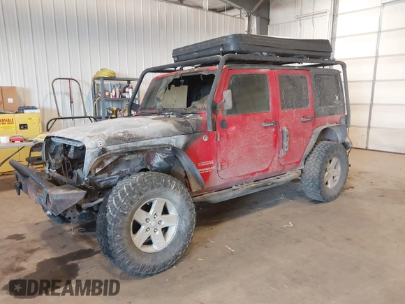 2011 Jeep Wrangler Unlimited Sport with VIN 1J4HA3H1XBL534312, listed as a IAAI auction lot 41030703 with 1 mi miles. Bid and sale history available at carsss.com. Image 2.