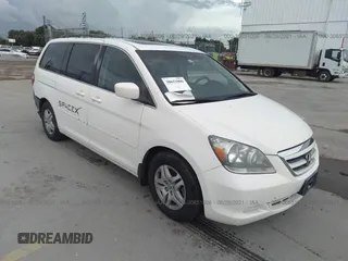 2006 Honda Odyssey EX-L with VIN 5FNRL38756B084148, listed as a IAAI auction lot 41694915 with 164,915 mi miles. Bid and sale history available at carsss.com. Image 1.
