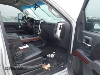 2016 GMC Sierra 2500HD SLT z VIN 1GT12TE89GF183548, wystawiony jako IAAI lot #40476400 z przebiegiem 203 148 mil mil oraz . Historia ofert i sprzedaży dostępna na DreamBid. Obrazek 5.
