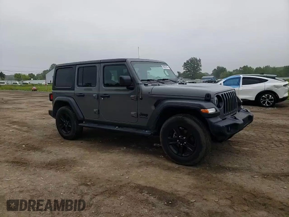 2020 Jeep Wrangler Unlimited Sport Altitude with VIN 1C4HJXDG2LW314301, listed as a Copart auction lot 59857615 with 60,684 mi miles and Salvage title. Bid and sale history available at DreamBid. Image 14.
