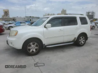 2011 Honda Pilot Touring z VIN 5FNYF3H96BB027228, wystawiony jako Copart lot #56532495 z przebiegiem 208 853 mil mil oraz Szkoda całkowita • Salvage title. Historia ofert i sprzedaży dostępna na DreamBid. Obrazek 1.