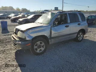 2003 Chevrolet Tracker z VIN 2CNBE13C636908563, wystawiony jako Copart lot #76871754 z przebiegiem 205 684 mil mil oraz Szkoda całkowita • Salvage title. Historia ofert i sprzedaży dostępna na DreamBid. Obrazek 1.