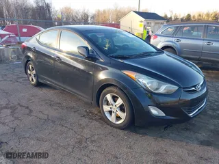 2012 Hyundai Elantra GLS with VIN KMHDH4AE8CU254219, listed as a IAAI auction lot 41206192 with 210,817 mi miles. Bid and sale history available at carsss.com. Image 1.