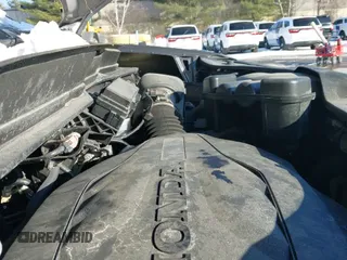 2021 Honda Pilot Touring 7-Passenger z VIN 5FNYF6H61MB089338, wystawiony jako IAAI lot #41417656 z przebiegiem 54 421 mil mil oraz . Historia ofert i sprzedaży dostępna na DreamBid. Obrazek 19.