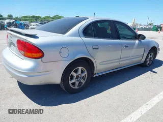 2004 Oldsmobile Alero GL1 z VIN 1G3NL52E04C197517, wystawiony jako IAAI lot #42315934 z przebiegiem Nie podano mil oraz . Historia ofert i sprzedaży dostępna na DreamBid. Obrazek 4.