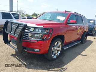2015 Chevrolet Tahoe LT with VIN 1GNSKBKC6FR628355, listed as a IAAI auction lot 42159743 with 95,730 mi miles and . Bid and sale history available at DreamBid. Image 17.