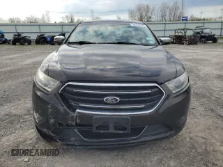 2014 Ford Taurus Limited z VIN 1FAHP2F85EG151167, wystawiony jako Copart lot #54376275 z przebiegiem 136 612 mil mil oraz Szkody całkowita. Historia ofert i sprzedaży dostępna na DreamBid. Obrazek 5.