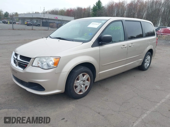 2012 Dodge Grand Caravan SE with VIN 2C4RDGBG4CR298996, listed as a IAAI auction lot 42133423 with 70,354 mi miles and . Bid and sale history available at DreamBid. Image 2.