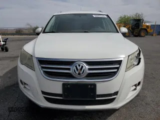 2010 Volkswagen Tiguan Wolfsburg Edition with VIN WVGAV7AX7AW003188, listed as a Copart auction lot 56692535 with 121,502 mi miles and Salvage title. Bid and sale history available at DreamBid. Image 5.