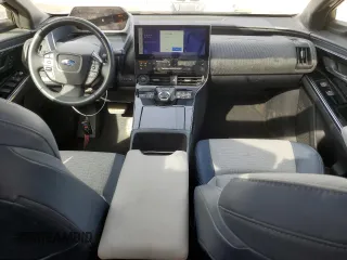 2023 Subaru Solterra Limited z VIN JTMABABA9PA013103, wystawiony jako Copart lot #45185785 z przebiegiem 43 952 mil mil oraz Szkody całkowita. Historia ofert i sprzedaży dostępna na DreamBid. Obrazek 8.
