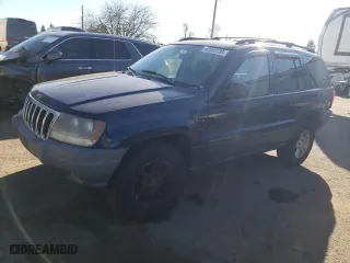 2003 Jeep Grand Cherokee Laredo with VIN 1J4GW48S13C588269, listed as a Copart auction lot 42303735 with 205,121 mi miles and Salvage Title. Bid and sale history available at carsss.com. Image 1.