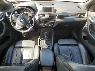 2018 BMW X1 xDrive28i with VIN WBXHT3C30J5F92074, listed as a Copart auction lot 51069535 with 116,381 mi miles and Salvage Title. Bid and sale history available at carsss.com. Image 8.
