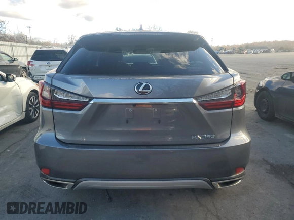 2021 Lexus RX with VIN 2T2AZMDA7MC275120, listed as a Copart auction lot 80251094 with 8,595 mi miles and Salvage Title. Bid and sale history available at carsss.com. Image 6.