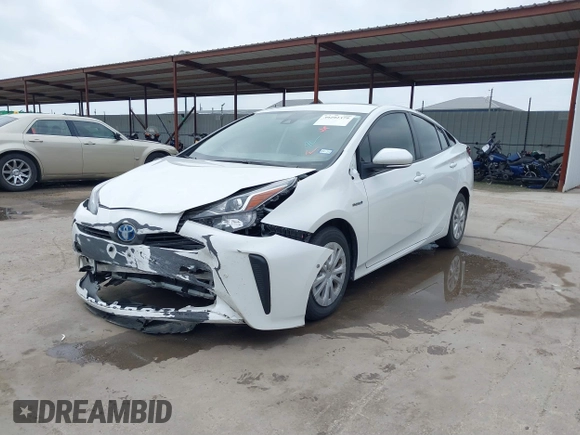 2022 Toyota Prius L Eco with VIN JTDKAMFUXN3157225, listed as a IAAI auction lot 39292379 with 59,333 mi miles and . Bid and sale history available at DreamBid. Image 18.