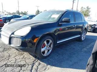 2006 Porsche Cayenne Turbo with VIN WP1AC29P46LA91061, listed as a IAAI auction lot 41302590 with 159,035 mi miles. Bid and sale history available at carsss.com. Image 2.
