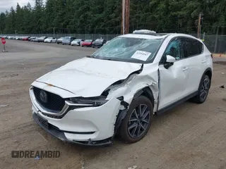 2018 Mazda CX-5 Grand Touring with VIN JM3KFBDM1J0382306, listed as a IAAI auction lot 42554947 with 121,303 mi miles and . Bid and sale history available at DreamBid. Image 17.