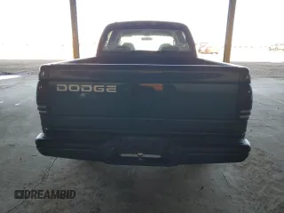 2000 Dodge Dakota Sport z VIN 1B7GL2AX9YS691378, wystawiony jako Copart lot #49793345 z przebiegiem 191 613 mil mil oraz Czysty tytuł • Clean title. Historia ofert i sprzedaży dostępna na DreamBid. Obrazek 6.