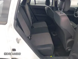 2011 Dodge Caliber Mainstreet with VIN 1B3CB3HA0BD157191, listed as a IAAI auction lot 42128580 with 185,474 mi miles. Bid and sale history available at carsss.com. Image 8.