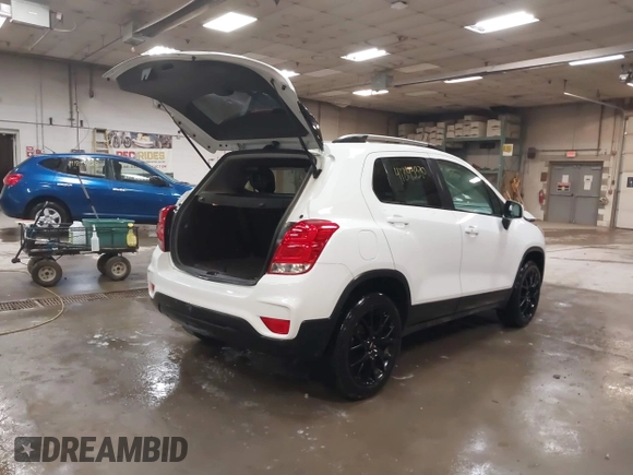 2022 Chevrolet Trax LT with VIN KL7CJPSM0NB537074, listed as a IAAI auction lot 41843390 with 74,100 mi miles and . Bid and sale history available at DreamBid. Image 4.