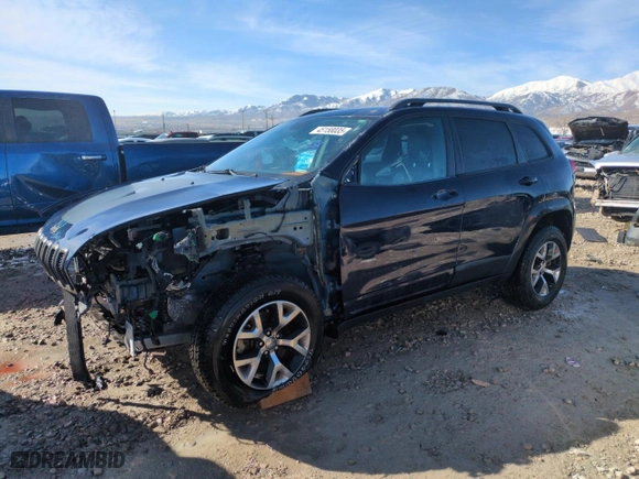 2015 Jeep Cherokee Trailhawk with VIN 1C4PJMBS6FW778665, listed as a Copart auction lot 48158035 with 107,638 mi miles and Salvage Title. Bid and sale history available at carsss.com. Image 1.