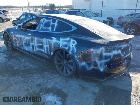 2013 Tesla Model S with VIN 5YJSA1CNODFP07903, listed as a IAAI auction lot 41281788 with Not Provided miles. Bid and sale history available at carsss.com. Image 3.