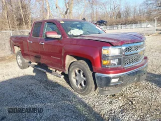 2015 Chevrolet Silverado 1500 LT with VIN 1GCRCREC2FZ354466, listed as a IAAI auction lot 41751329 with 134,690 mi miles. Bid and sale history available at carsss.com. Image 1.