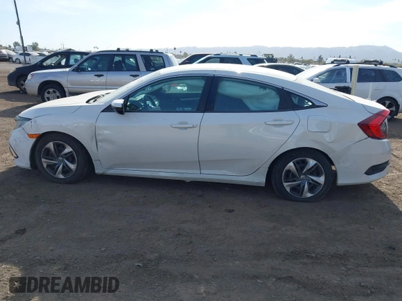 2019 Honda Civic Sedan LX with VIN 2HGFC2F62KH573149, listed as a IAAI auction lot 41575660 with 104,139 mi miles. Bid and sale history available at carsss.com. Image 14.