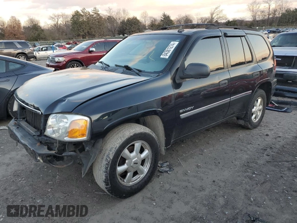 2006 GMC Envoy SLT with VIN 1GKDS13S662220064, listed as a Copart auction lot 84381274 with 237,220 mi miles and Salvage Title. Bid and sale history available at carsss.com. Image 1.