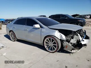 2018 Cadillac XTS with VIN 2G61L5S34J9134469, listed as a Copart auction lot 46660945 with 122,011 mi miles and Salvage Title. Bid and sale history available at carsss.com. Image 4.