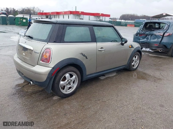 2010 MINI Cooper Hardtop with VIN WMWMF3C58ATZ24045, listed as a IAAI auction lot 41871593 with NaN miles. Bid and sale history available at carsss.com. Image 4.