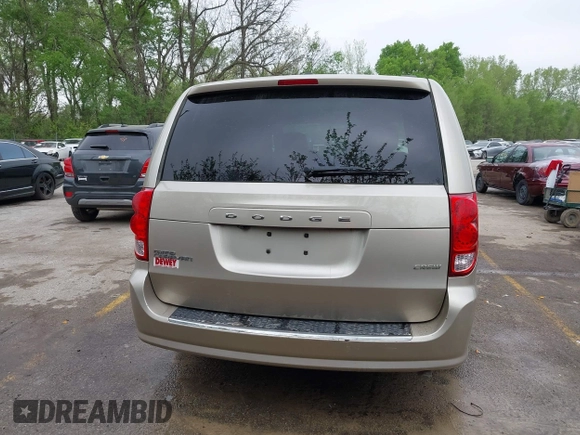 2013 Dodge Grand Caravan Crew with VIN 2C4RDGDG7DR624563, listed as a IAAI auction lot 42038157 with 265,044 mi miles and . Bid and sale history available at DreamBid. Image 16.