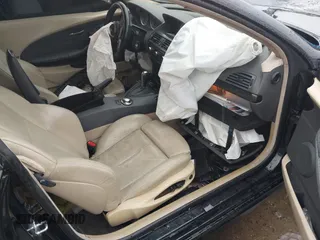2005 BMW 6 Series 645Ci with VIN WBAEH73435CF95261, listed as a IAAI auction lot 41993137 with 111,988 mi miles. Bid and sale history available at carsss.com. Image 5.